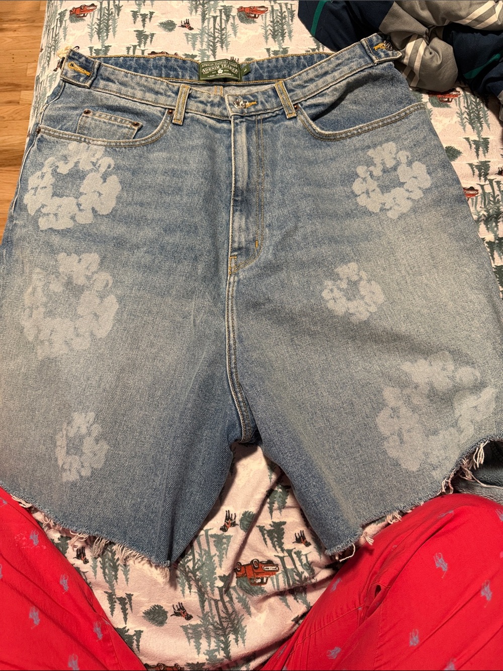 Light Wash Denim Jean Shorts with Faded Floral Pattern - Men